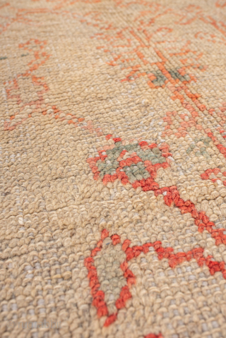 Item 99687 
8'10 x 10'9 

This charming antique Oushak rug features a soft, time-worn palette of blush, apricot, and golden tones that feel warm and inviting. Its open field is decorated with  ...