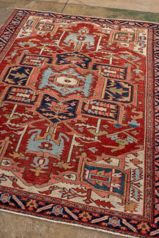 Antique Persian Serapi Rug with Geometric Medallion, Circa 1900. Bold geometric medallion surrounded by angular floral motifs on a warm rust-red field.
5'0" x 6'3"
Item No: 101962
