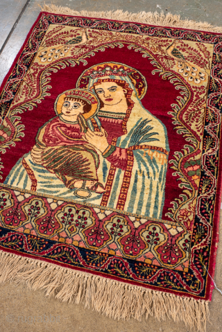 Vintage Persian Lavar Kerman Pictorial Rug with Madonna and Child, Circa 1940. Depicts the Madonna and Child beneath an architectural arch, surrounded by peacocks, flowering branches, and an ornate floral border.
2'0" x ...