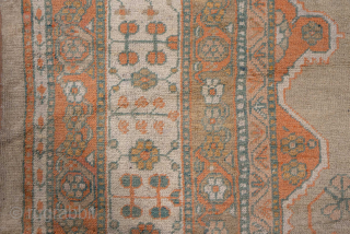 This exceptional antique Oushak rug, woven circa 1900, is a magnificent example of large-scale Anatolian weaving. Measuring over 13 × 16 feet, it features a grand central medallion design flanked by smaller  ...