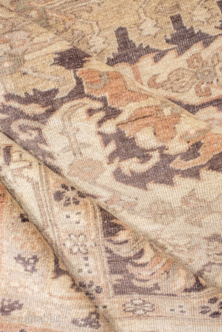 This magnificent antique Oushak rug showcases a highly decorative repeating lattice motif, executed in a refined palette of soft taupe, ivory, muted rose, and charcoal accents. The allover design conveys symmetry and  ...