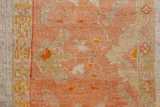 This magnificent antique Oushak rug, woven circa 1900, showcases the timeless elegance for which Oushak weaving is celebrated. The expansive 13 × 15 ft scale makes it a commanding centerpiece, perfect for  ...