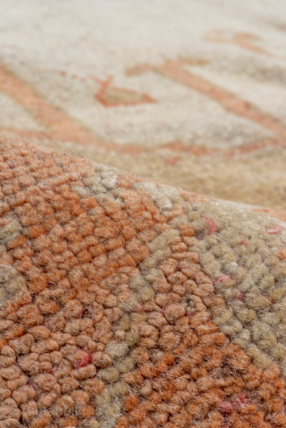 This magnificent antique Oushak rug, woven circa 1900, showcases the timeless elegance for which Oushak weaving is celebrated. The expansive 13 × 15 ft scale makes it a commanding centerpiece, perfect for  ...