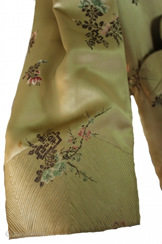 Absolutely breathtaking 19th century, silk couture Japanese kimono robe! Features the finest of gold silk, with a beautiful colorful flowers embroidered throughout. Hand sewn intricate stitching details on the bodice, sleeve cuffs,  ...