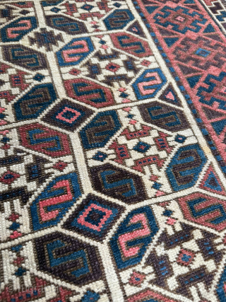 Middle of 19th Century North East Persia, Baluch Rug
In this Baluch rug of the head and shoulders type, the border is recessed at right angles in the upper section of the field,  ...