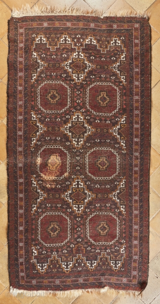 Salar Khani Baluch with striking design and colors (208x107cm). If you can go through some conditions issues like the stain of bleach on the back and some parts of the headens missing  ...