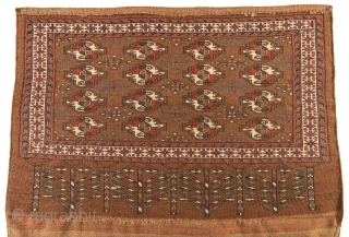 Yomut chuval complete with kilim back. Cm 127x79. Late 19th/early 20th century. Beautiful antique chuval with 4x4 Gouls field design. Secondary Gouls with cross/snow flake design in dual color combination including wonderful  ...