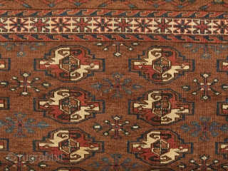 Yomut chuval complete with kilim back. Cm 127x79. Late 19th/early 20th century. Beautiful antique chuval with 4x4 Gouls field design. Secondary Gouls with cross/snow flake design in dual color combination including wonderful  ...