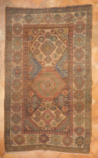 Antique Talish from South Caucasus. Beautiful and rare "kilim" design with multicolor hooked medallions with ram’s horns and Mother Goddess figures. Classic main border on white ground with big palmettes, eight pointed  ...