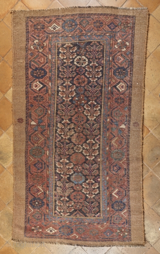 Antique real camel hair Hamadan rug (189x107cm) probably early 20th. Low but even pile and headens partially reduced (but this does not affect the design). Very fine wave and very flexible handle.  ...
