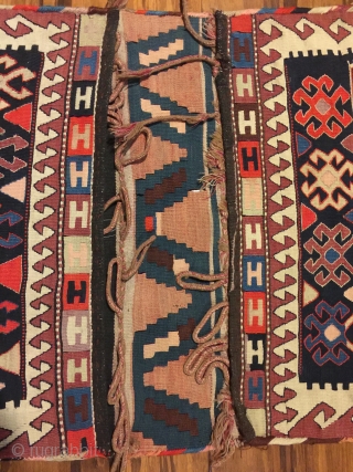 Antique kilim khorjin, Kurds of Varamin. 55” X 25-1/2”. Circa 1900. Good colors. Complete and in untouched original condition with intact edge wrapping and closure loops.       