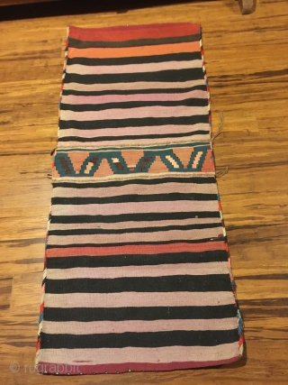 Antique kilim khorjin, Kurds of Varamin. 55” X 25-1/2”. Circa 1900. Good colors. Complete and in untouched original condition with intact edge wrapping and closure loops.       