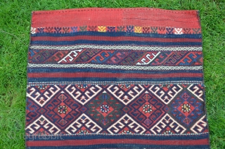 Western Anatolian flatwoven çuval (Karakeçili). 48 in. X 27-1/2 in. Circa 1900. All natural dyes. Reciprocal brocaded designs on face and striped plainwoven back. Almost perfect unused condition.     