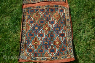 Rare antique Kordi flatwoven khorjin.1’8-1/2”X4’2”. Circa 1900. Wool. Saturated natural dyes. Knotted weft wrapping from Lain district of Khorasan. For comparable example see Wilfried Stanzer’s “Kordi” pp. 182-183. Perfect condition. Ex Adil  ...