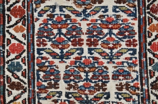 Antique Shahsavan flat woven mini khorjin. 28-1/2" X 11". Circa 1900. Soumac bud and flower design on cotton ground. Beautiful natural colors. Fine original condition.        