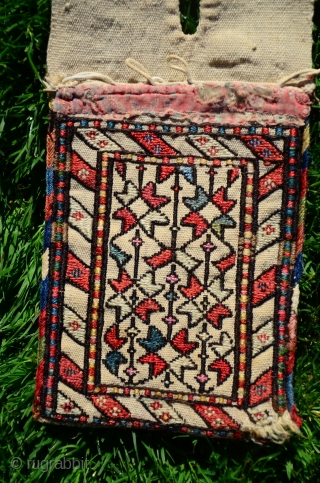 Antique Shahsavan flatwoven mini khorjin. 23" X 6-1/2".Circa 1900. Wool (unusual- most of these mini khorjins are woven on cotton). Soumac star designs in natural colors. Trade cloth and loops at top  ...