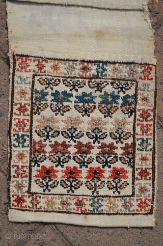 Antique Shahsavan flatwoven mini khorjin. 20" X 7-1/2". circa 1900. Wool sumac designs on cotton ground. Plainwoven back. Bud and flower motifs in natural dyes (with a touch of fuchsin testifying to  ...