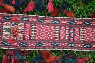 Turkmen tent band. 15 ft (including tassels) X 3-1/2 in. 13 ft 6 in excluding tassels. All wool. Natural colors. An antique flatwoven piece in perfect condition.      