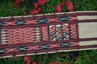 Turkmen tent band. 15 ft (including tassels) X 3-1/2 in. 13 ft 6 in excluding tassels. All wool. Natural colors. An antique flatwoven piece in perfect condition.      