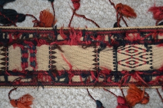 Turkmen tent band. 15 ft (including tassels) X 3-1/2 in. 13 ft 6 in excluding tassels. All wool. Natural colors. An antique flatwoven piece in perfect condition.      