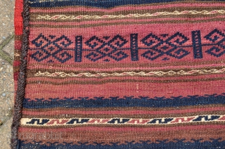 Large Baluch flat woven khorjin, 2nd. Q. 20th C. 64" X 34". Wool. Weft substitution designs on face, plain woven striped back. goathair fastening loops and edge wrapping intact. Excellent condition. No  ...