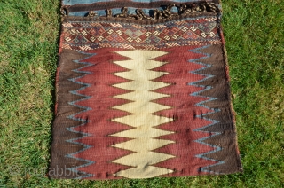 Caucasian Kazakh flat woven khorjin. 4 ft. 8 in. X 2 ft. 19th C. Wool. Natural colors. Excellent condition. Slitwoven with brocaded elements in bridge.        