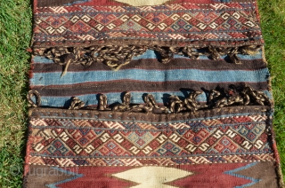 Caucasian Kazakh flat woven khorjin. 4 ft. 8 in. X 2 ft. 19th C. Wool. Natural colors. Excellent condition. Slitwoven with brocaded elements in bridge.        