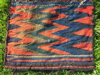 Antique Jabel Barez chanteh, 18”X14”, 19th C. Wool. Face in weft substutution weave. Serrated kilim back. A panoply of beautuful natural dyes. Goat hair wrapping. Good condition for age. Compelling tribal character.  ...