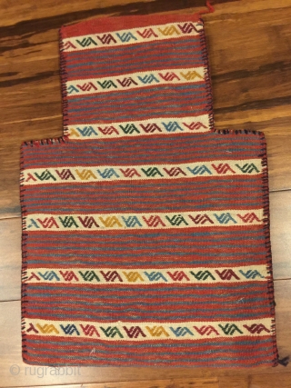 Kordi salt bag. 20-1/2" X 14". First 1/2 20th C. All wool. Brocaded face and decorated striped plain woven back. Finely woven with natural colors and trademark tight Kordi edge binding. Perfect  ...