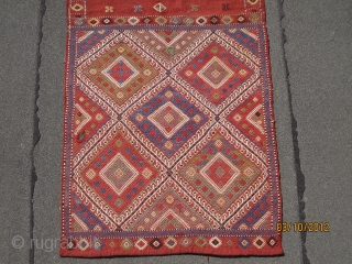 Magnificent Caucasian bag, circa 1880, with spectacular colors, great visual effect, in superb condition, measuring 2-6" x 5'-7" or 76 cm x 170 cm.  A great example of its kind.  