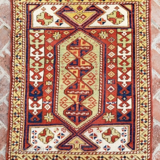 Wonderful rug from Ezine or Canakkale, 2nd half of the 19th century, measuring 2-11 × 3-9.5.                 