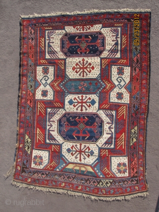 Sexy Kuba rug,circa 1860, with bold and rare design, in very good condition with oxidation to brown, measuring 5'-1" x 3'-8" or 155 cm x 124 cm, great wool and supple handle.  ...