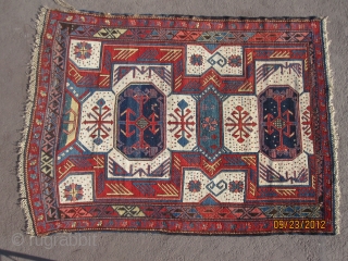 Sexy Kuba rug,circa 1860, with bold and rare design, in very good condition with oxidation to brown, measuring 5'-1" x 3'-8" or 155 cm x 124 cm, great wool and supple handle.  ...