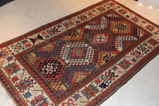 Terrific Kazak – 19th century –

Extremely beautiful and early Kazak carpet with the best possible colours (aubergine, etc.) and a gorgeous iconography! 

approx. 234 x 147 cm

Collector’s item!  Rare!

In good condition!  ...