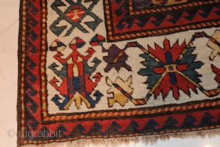 Terrific Kazak – 19th century –

Extremely beautiful and early Kazak carpet with the best possible colours (aubergine, etc.) and a gorgeous iconography! 

approx. 234 x 147 cm

Collector’s item!  Rare!

In good condition!  ...