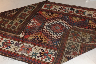 Terrific Kazak – 19th century –

Extremely beautiful and early Kazak carpet with the best possible colours (aubergine, etc.) and a gorgeous iconography! 

approx. 234 x 147 cm

Collector’s item!  Rare!

In good condition!  ...