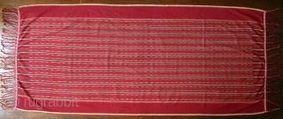 Sumatra | early 20th C Batak ceremonial textile Ulos Mangiring 

Sumatra, Batak people, Toba, Silindung; c. 1930

Commercial cotton, natural and commercial dyes, warp ikat, continuous supplementary warp weaving

A single dark rose red  ...