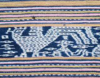 Timor | Men's cloth (beti) with ikat roosters | Indonesia

West Timor, Insana, Manufui, 1950s

Handspun cotton, natural indigo dye, warp ikat, commercial coloured thread (pinstripes), twining 

Description: An elegant vintage men’s cloth (beti)  ...