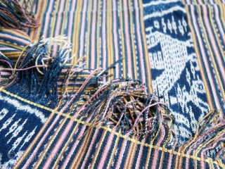 Timor | Men's cloth (beti) with ikat roosters | Indonesia

West Timor, Insana, Manufui, 1950s

Handspun cotton, natural indigo dye, warp ikat, commercial coloured thread (pinstripes), twining 

Description: An elegant vintage men’s cloth (beti)  ...