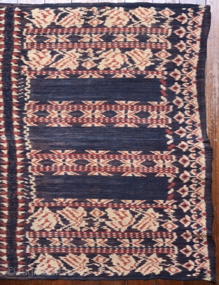 Ikat coffin cover or skirt 

Origin: Roti island, Indonesia, c. 1900 

Technique: Handspun cotton, natural dyes, warp ikat 

Notes: This piece consists of two panels joined together along the selvedge. It was  ...