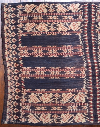 Ikat coffin cover or skirt 

Origin: Roti island, Indonesia, c. 1900 

Technique: Handspun cotton, natural dyes, warp ikat 

Notes: This piece consists of two panels joined together along the selvedge. It was  ...