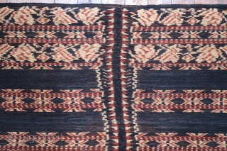 Ikat coffin cover or skirt 

Origin: Roti island, Indonesia, c. 1900 

Technique: Handspun cotton, natural dyes, warp ikat 

Notes: This piece consists of two panels joined together along the selvedge. It was  ...