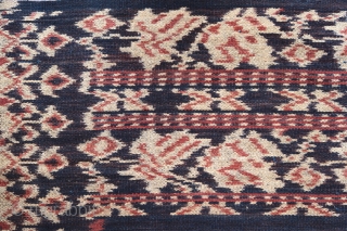 Ikat coffin cover or skirt 

Origin: Roti island, Indonesia, c. 1900 

Technique: Handspun cotton, natural dyes, warp ikat 

Notes: This piece consists of two panels joined together along the selvedge. It was  ...