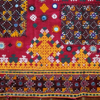 Rajasthan Sindh Embroidered Cover

Dowry cloth, pillow cover

Rajasthan, Jaisalmer, Sindh people, Mahar group, 20th century

Hand woven cotton, cotton and silk floss, mirrors, khaarek, interlacing and jat embroidery

A highly decorative squarish piece of lavish  ...