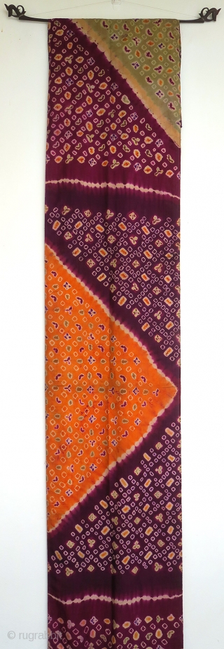 Bali | Tie-dye pelangi silk wrapper, early 20th century

Indonesia, Bali, Singaraja, early 20th century

Imported silk, aniline dyes, tie-dye (pelangi) and stitch-resist (tritik)

A stunning silk pelangi wrapper tie-dyed in Singaraja in north Bali.  ...