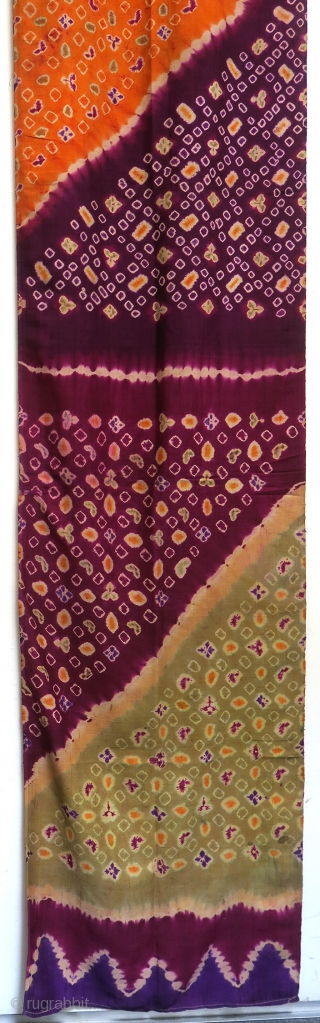 Bali | Tie-dye pelangi silk wrapper, early 20th century

Indonesia, Bali, Singaraja, early 20th century

Imported silk, aniline dyes, tie-dye (pelangi) and stitch-resist (tritik)

A stunning silk pelangi wrapper tie-dyed in Singaraja in north Bali.  ...