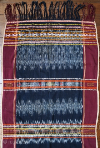 Sumatra | Batak Ikat Shoulder-cloth (Bintang Maratur)

Indonesia, Sumatra, Toba Batak, Silindung Valley; mid 20th C

Commercial cotton, natural and commercial dyes, warp ikat, supplementary warp and weft weaving, twining

A single panel with an  ...