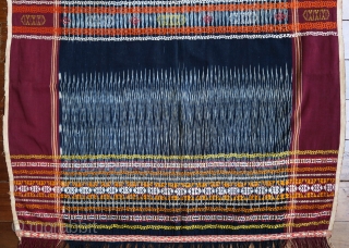 Sumatra | Batak Ikat Shoulder-cloth (Bintang Maratur)

Indonesia, Sumatra, Toba Batak, Silindung Valley; mid 20th C

Commercial cotton, natural and commercial dyes, warp ikat, supplementary warp and weft weaving, twining

A single panel with an  ...