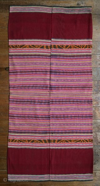 Timor Leste | Vintage festive tubeskirt lau o’o mimireke (‘red mouth cloth’)

Timor Leste, Baucau or West Lautem, 1970s

Warp ikat, supplementary warp weave, discontinuous supplementary weft

A festive red tubeskirt (lau o’o mimireke) woven  ...