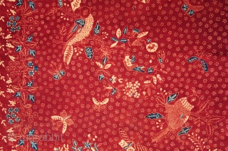 c. 1900 Javanese batik sarong

Origin: Indonesia, Java, Lasem, c. 1900
 
Technique: Commercial cotton, natural dyes, hand-drawn (tulis) batik
 
Description: A batik sarong hand-drawn in Lasem on the north coast of Java, of  ...